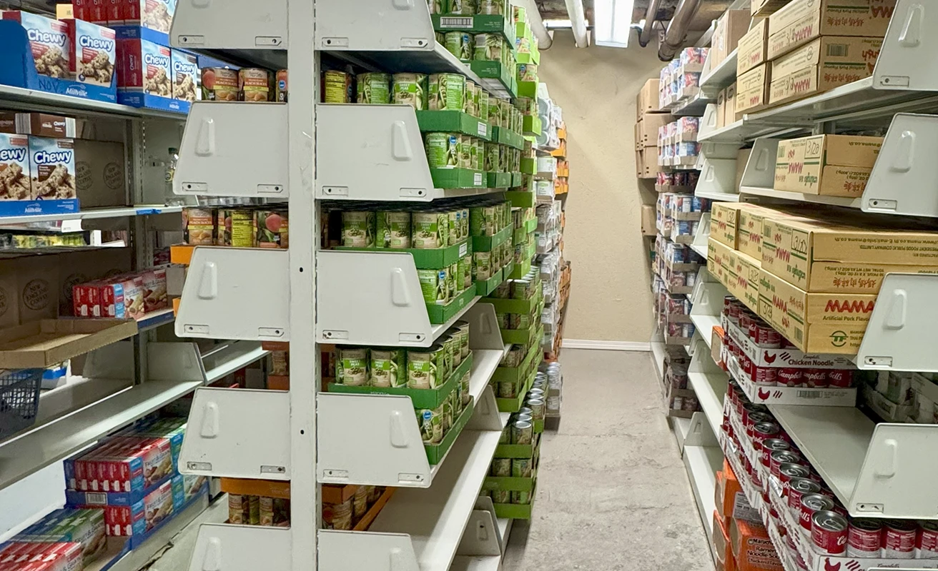 Food pantry full of canned goods.