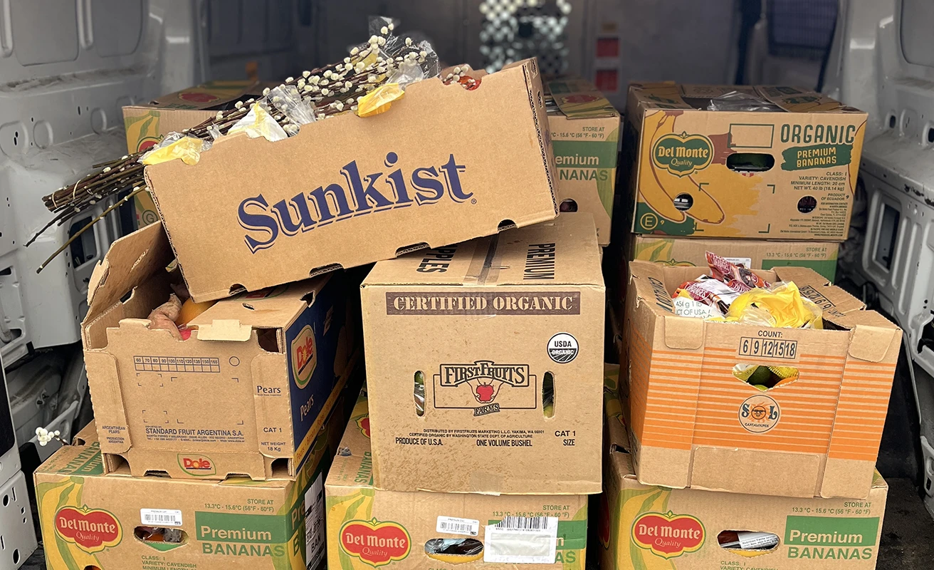 Image Block Project Hand Up, van filled with food boxes